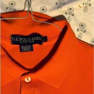 I’m selling men’s shirts. Polo Ralph Lauren, George, and Ben Hogan.